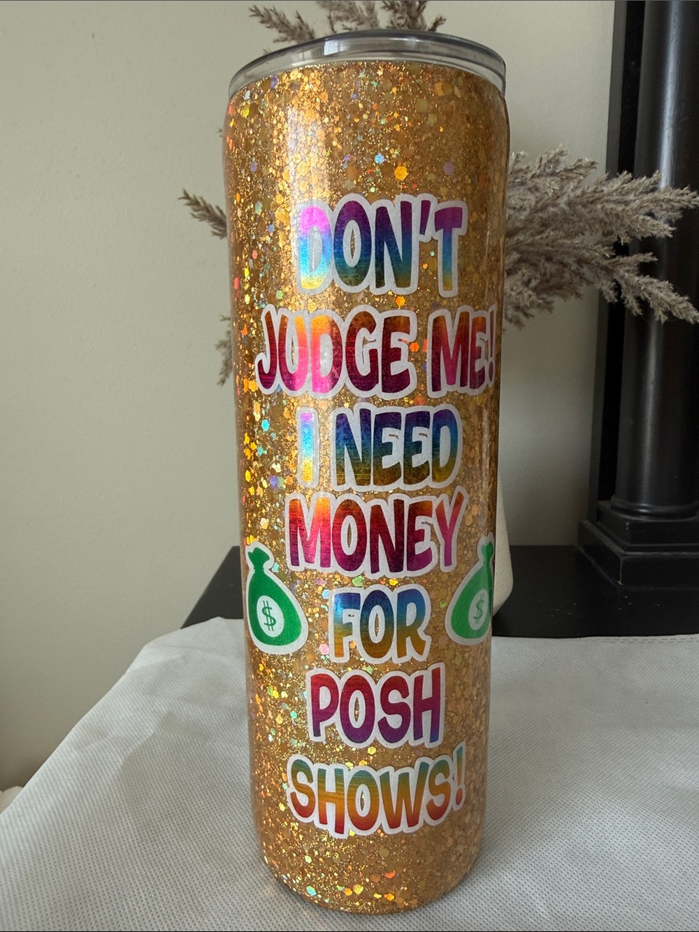 Tumbler with gold glitter that is perfect for any posture
